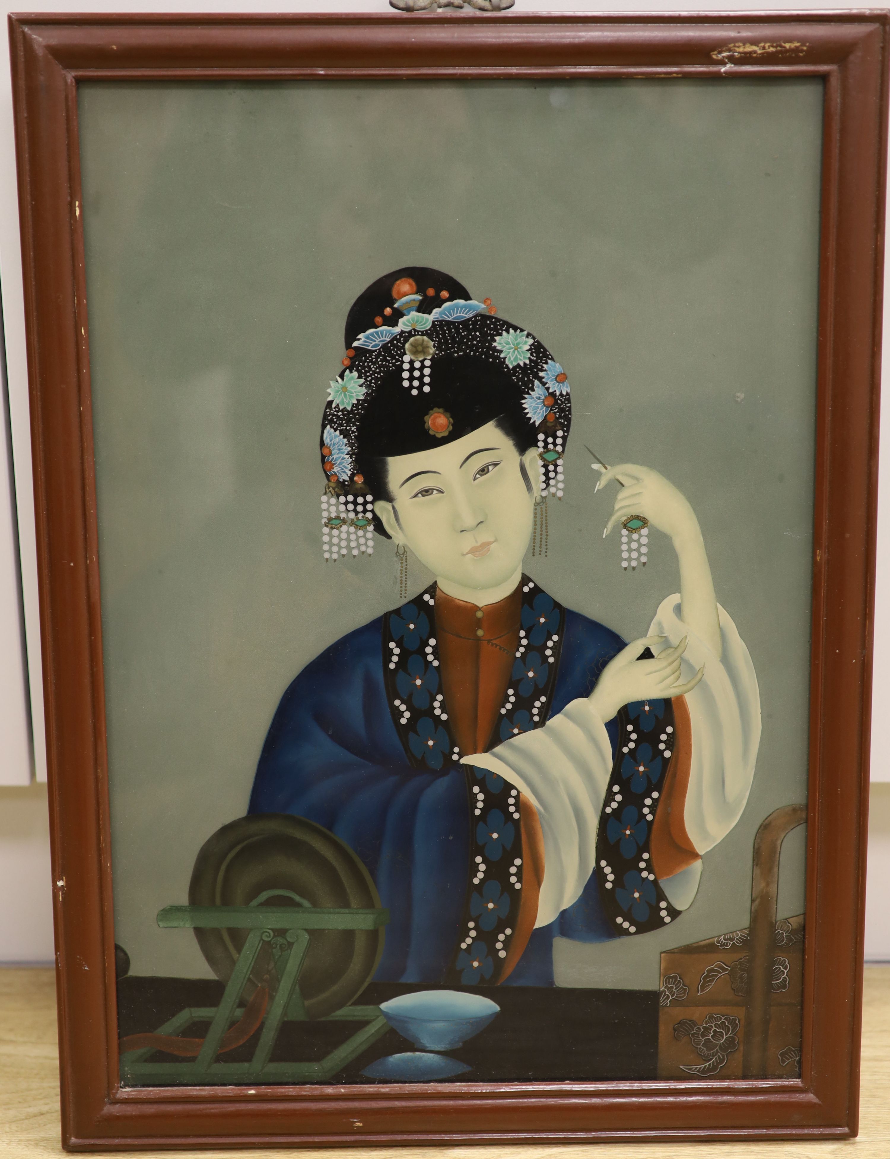 Chinese School, reverse painting on glass, Woman at a dressing table, 49 x 34cm